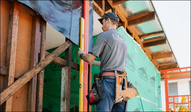 Legacy builders installing wall framing on a residential home extension — Townsville, North Queensland