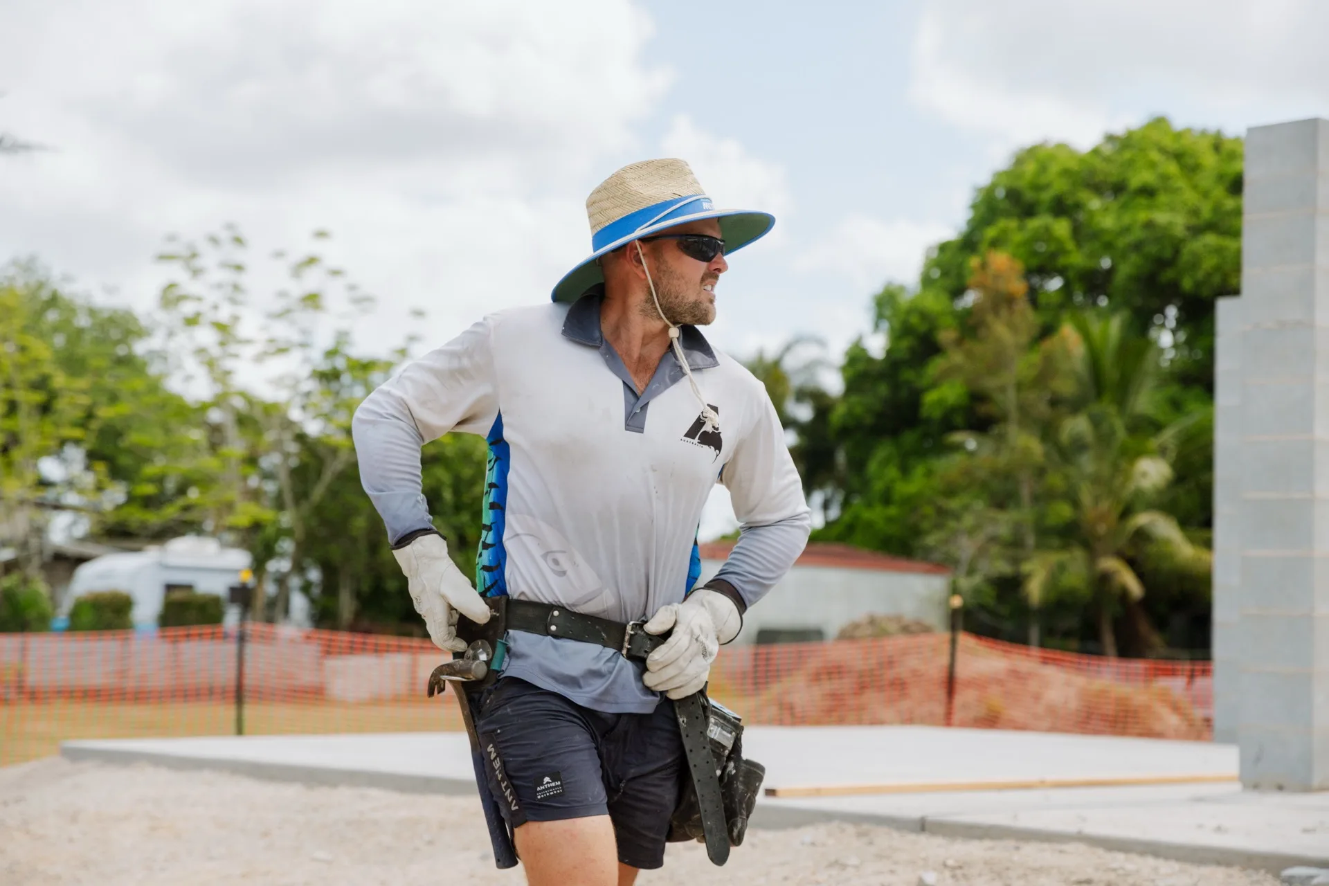 Legacy project manager on site overseeing a residential build — Townsville