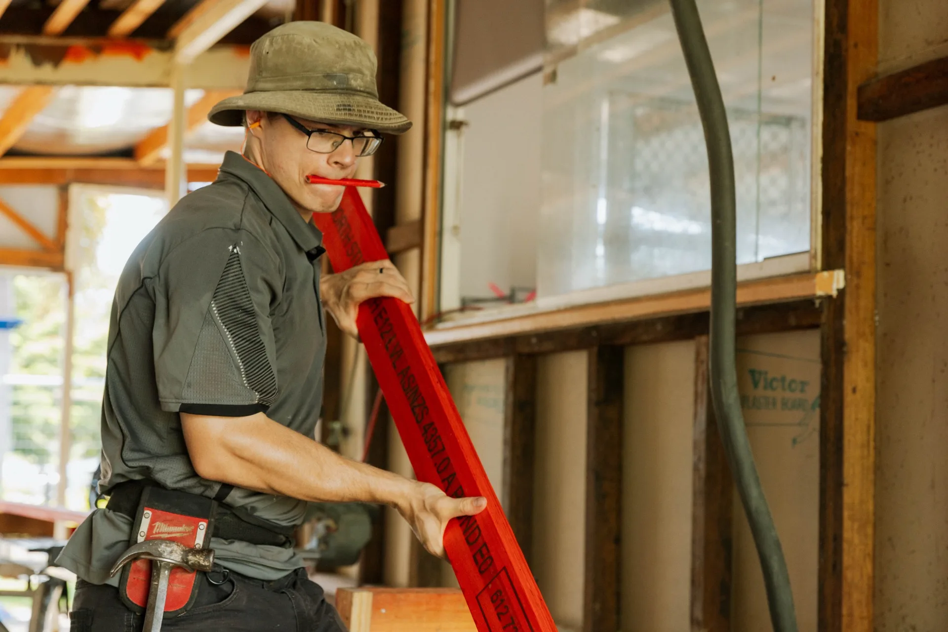 Legacy builder on ladder checking window framing during the extension